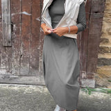 Robe élégante simple à manches longues avec poche de couleur unie