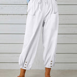 Pantalon taille haute bouton neuf points