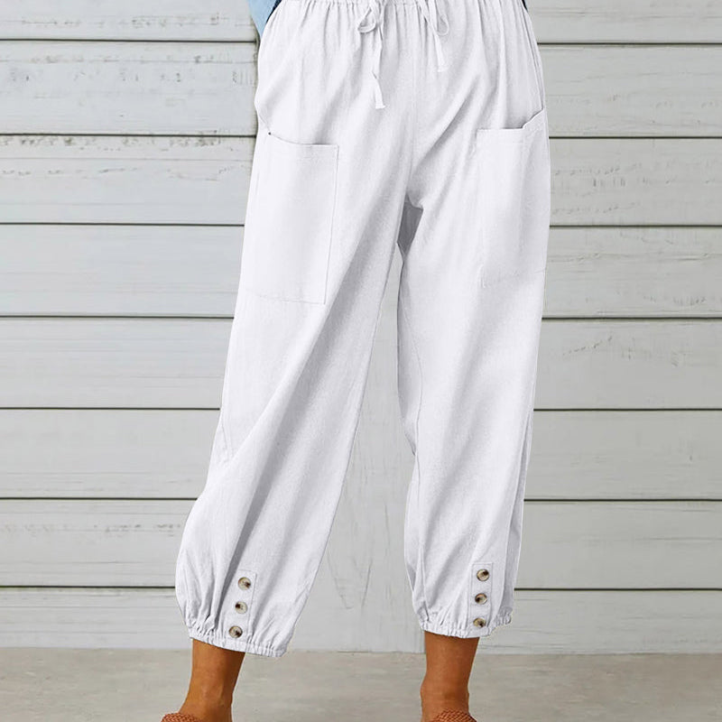 Pantalon taille haute bouton neuf points