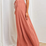 Pantalon taille haute de couleur unie