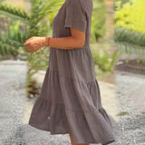Robe en coton lin avec col en V de couleur unie