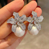 Boucles d'oreilles en perles de lys