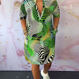 Robe à poches imprimée colorée avec col en V et demi-manches