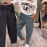 Pantalon décontracté de couleur unie avec poche