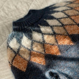 Pull à jacquard losange géométrique