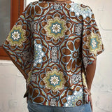 Blouse à demi-manches boutons avec col en V et imprimé rétro