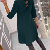 Robe unie avec nœud au dos