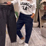 Pantalon décontracté de couleur unie avec poche