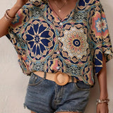 Blouse à demi-manches boutons avec col en V et imprimé rétro