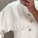 Manteau élégant à simple boutonnage de couleur unie