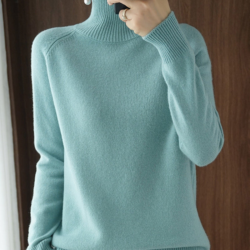 Pull simple à manches longues et col haut de couleur unie