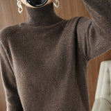 Pull simple à manches longues et col haut de couleur unie