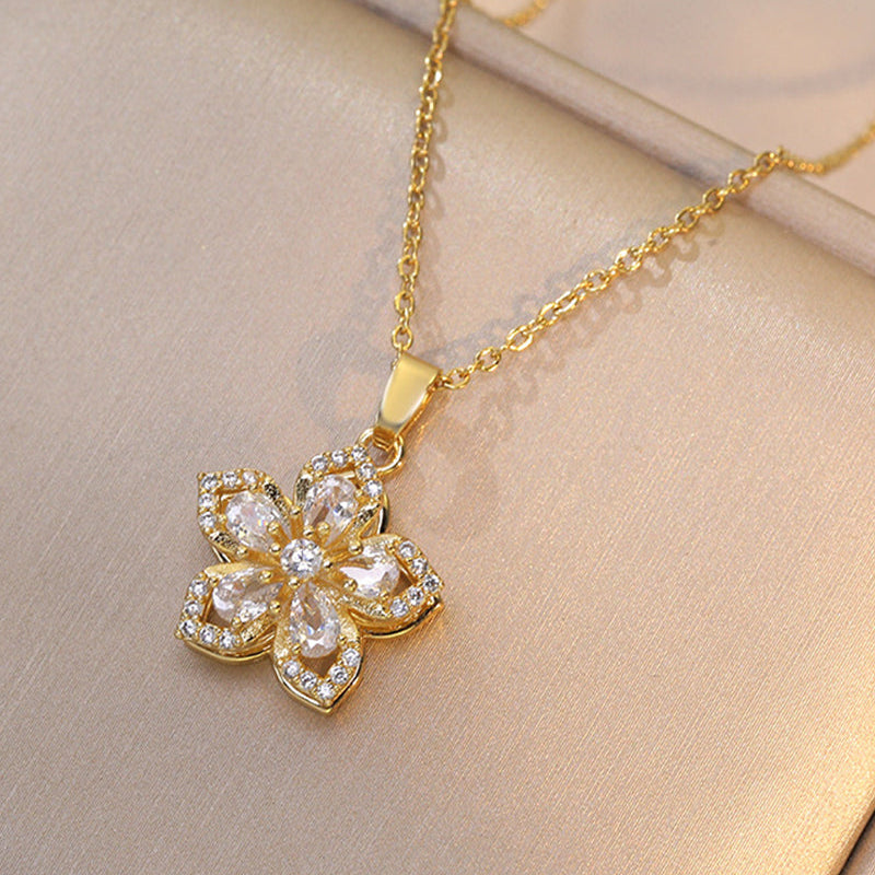 Collier pendentif rotatif à 360° à cinq pétales de fleur