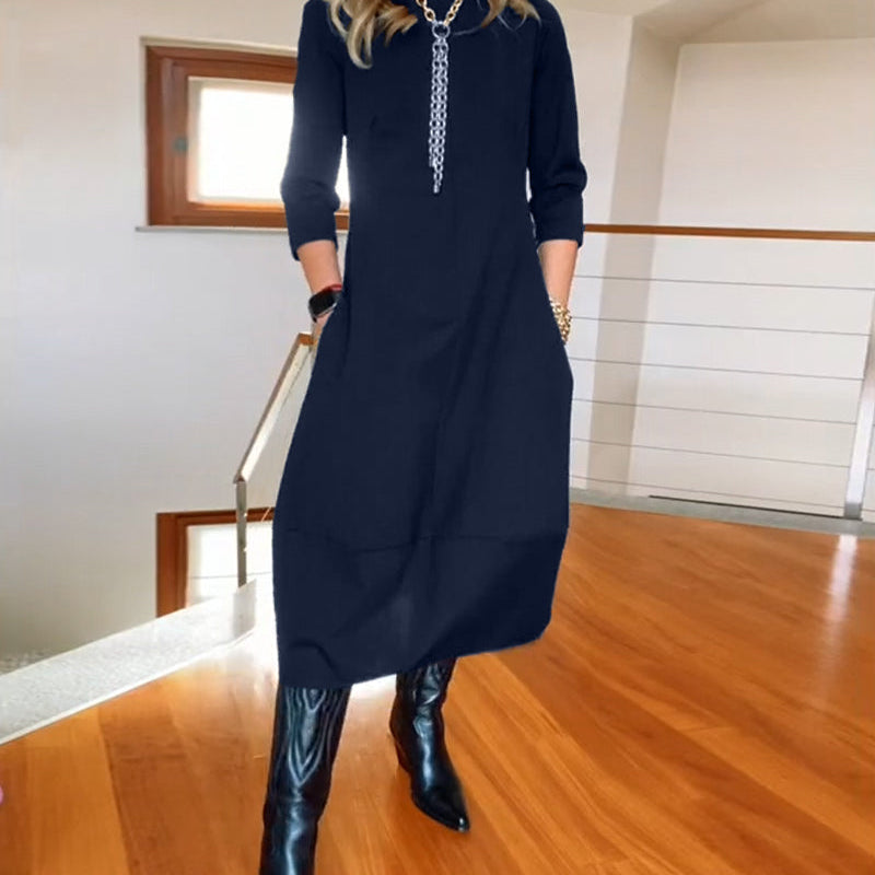 Robe élégante de couleur unie avec poche et col rond