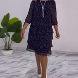 Robe élégante superposée à imprimé pois