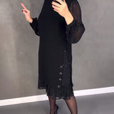 Robe élégante à pois et manches longues