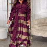 Robe élégante à rayures et à bretelles