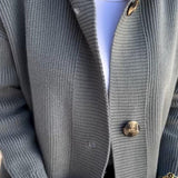 Cardigan décontracté à capuche avec poche boutonnée de couleur unie