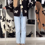 Cardigan à lacets avec perles et nœud