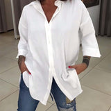 Chemise boutonnée de couleur unie à revers