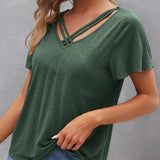 T-shirt à découpes de couleur unie