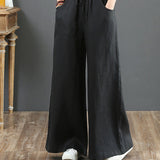 Pantalon large taille haute de couleur unie