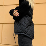 Manteau zippé à col haut de couleur unie
