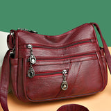 Sac bandoulière en cuir souple avec multipoches