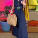 Robe longue slim élégante sans manches