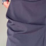 Robe élégante plissée à col rond de couleur unie
