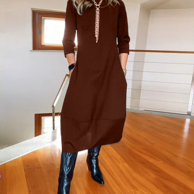 Robe élégante de couleur unie avec poche et col rond