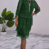 Robe élégante superposée à imprimé pois