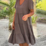 Robe en coton lin avec col en V de couleur unie