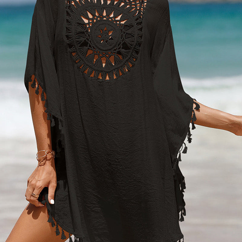 Couverture de plage avec pompons