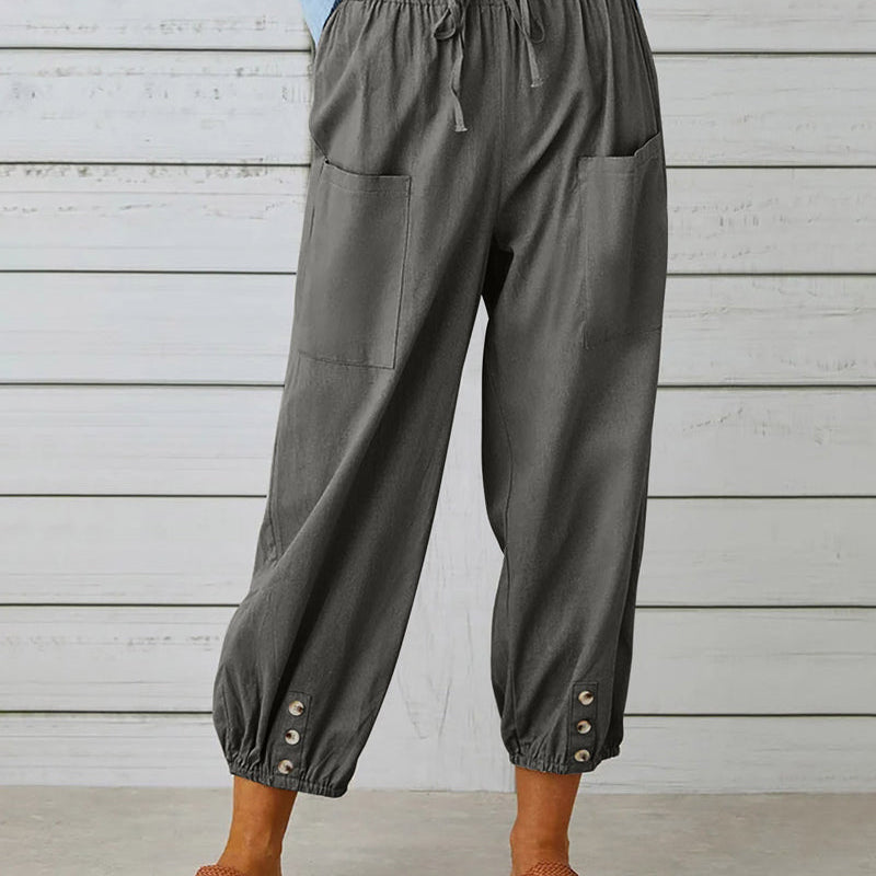 Pantalon taille haute bouton neuf points