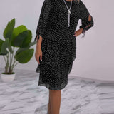 Robe élégante superposée à imprimé pois