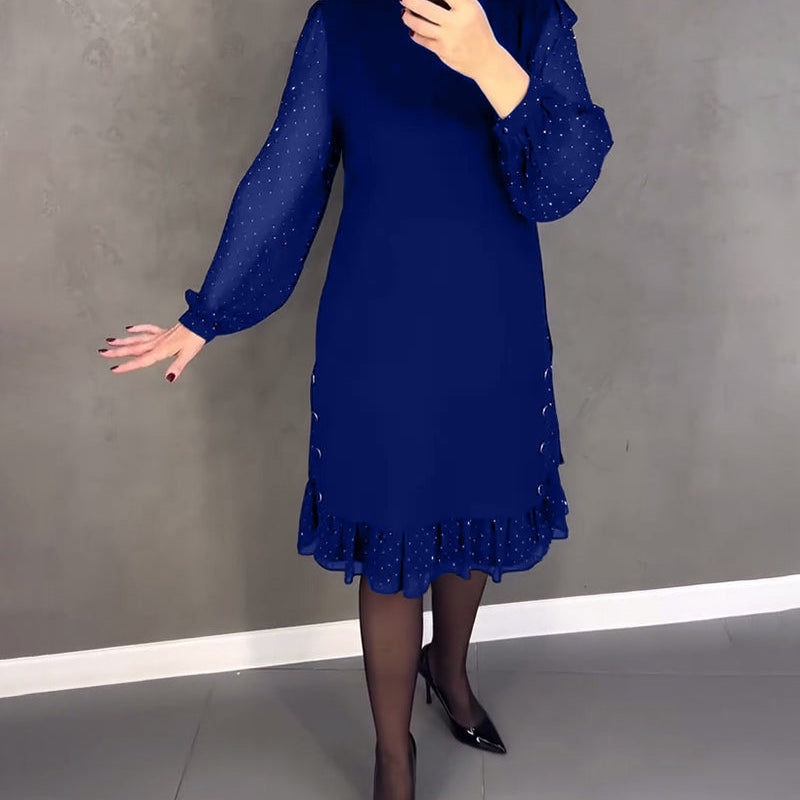 Robe élégante à pois et manches longues