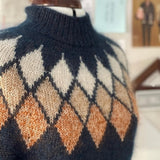Pull à jacquard losange géométrique