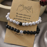 Ensemble de bracelets pour couple tissés en perles noires et blanches