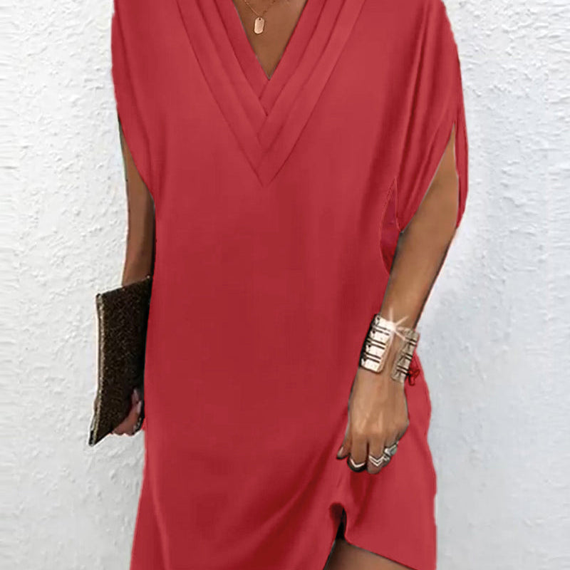Robe élégante à manches fendues de couleur unie