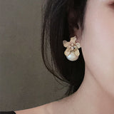 Boucles d'oreilles en perles de lys