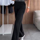 Pantalon droit décontracté de couleur unie avec poche zippée