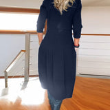 Robe élégante de couleur unie avec poche et col rond