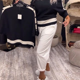 Pull boutonné color block