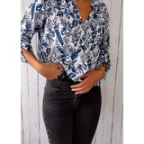 Blouse décontractée boutonnée imprimé feuilles, col V et manches neuf-quarts