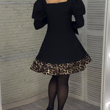 Robe élégante à manches bouffantes et imprimé léopard