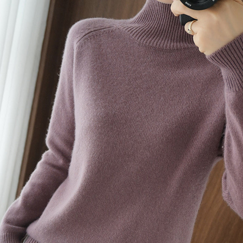 Pull simple à manches longues et col haut de couleur unie