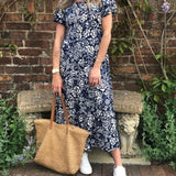 Robe longue à manches courtes imprimée de fleurs