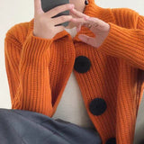 Cardigan à gros boutons et tissage tricot