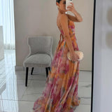 Robe d’été fluide à imprimé fleuri – silhouette féminine et légère